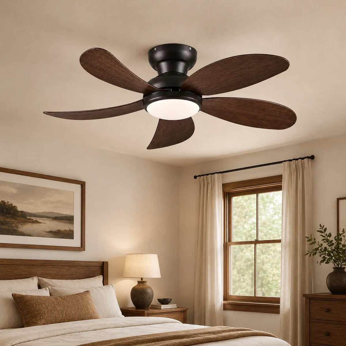 Black 42 inch flush mount ceiling fan with light installed in a modern bedroom